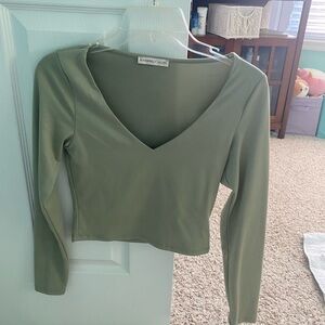 green v neck tight top size:xs